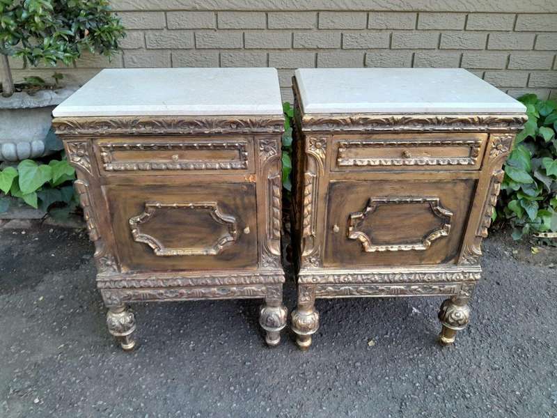 A Pair of French Style Ornately Carved Giltwood Pedestals/Side Tables with Marble Tops