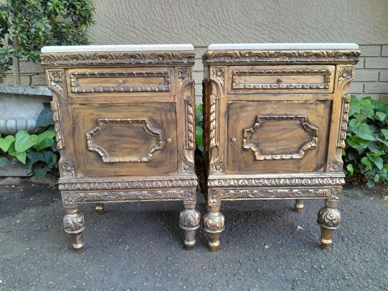 A Pair of French Style Ornately Carved Giltwood Pedestals/Side Tables with Marble Tops