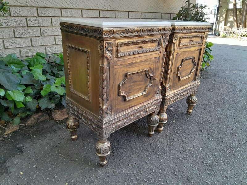 A Pair of French Style Ornately Carved Giltwood Pedestals/Side Tables with Marble Tops