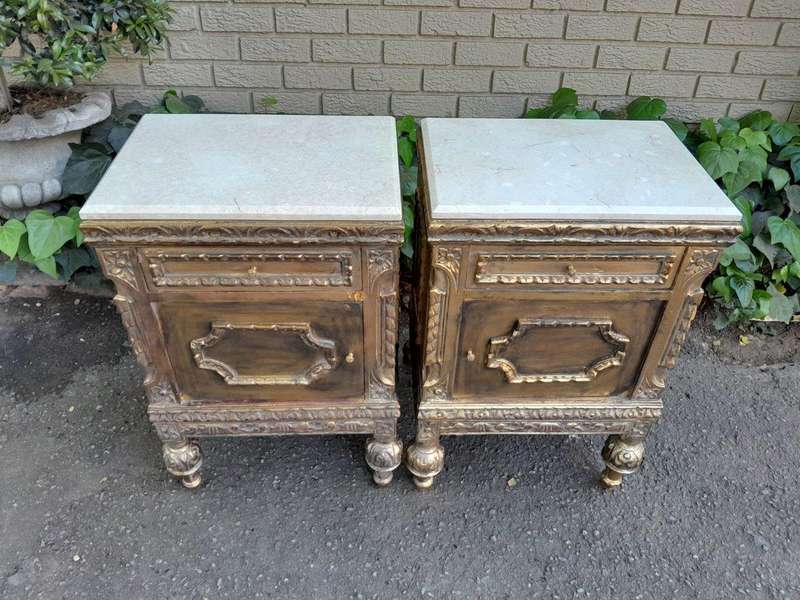 A Pair of French Style Ornately Carved Giltwood Pedestals/Side Tables with Marble Tops