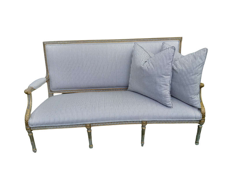 A 20th Century French  Style Carved and Hand Gilded Settee Upholstered in Ticking Fabric