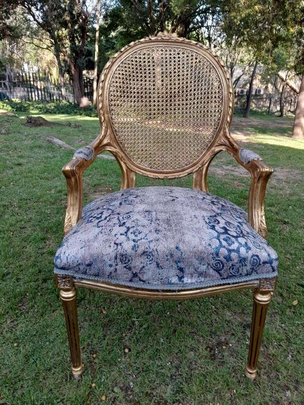 A Pair of 20th Century French Style Rattan-Back Gilded Arm Chairs
