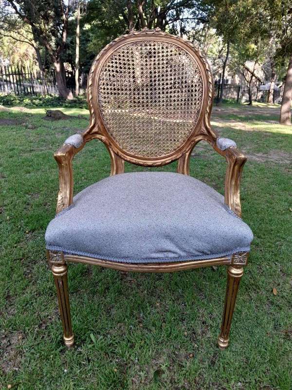 A Pair of 20th Century French Style Rattan-Back Gilded Arm Chairs
