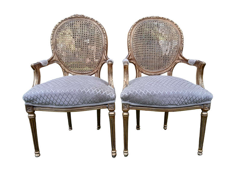 A Pair of 20th Century French Style Rattan-Back Gilded Arm Chairs
