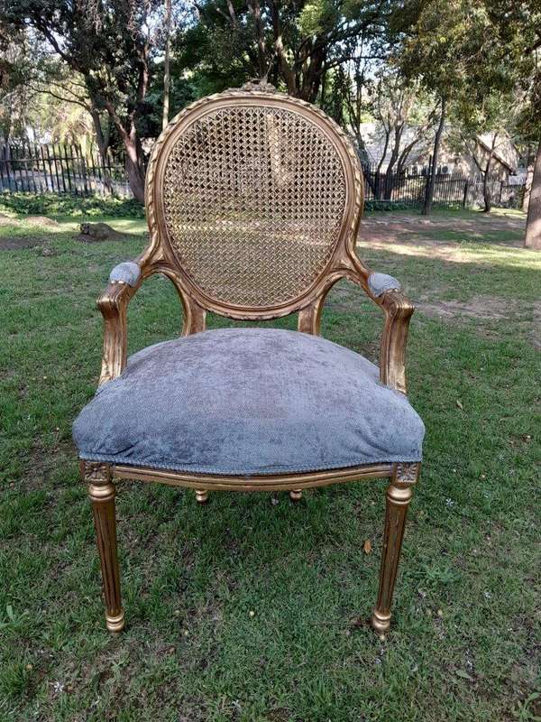 A Pair of 20th Century French Style Rattan-Back Gilded Arm Chairs