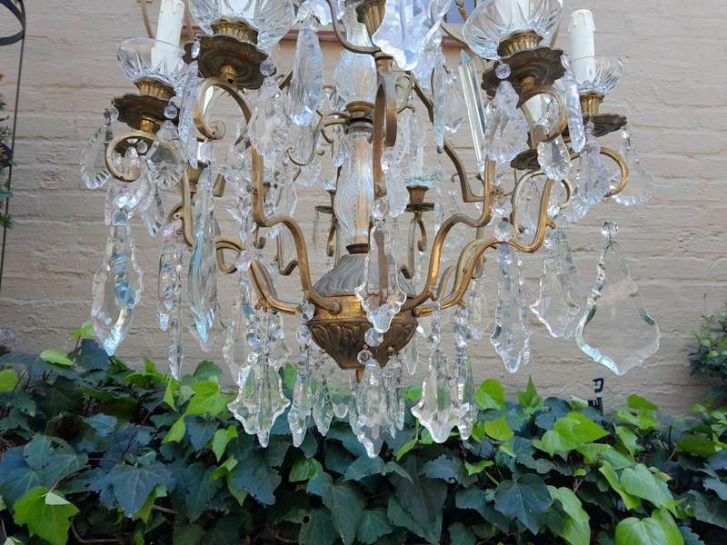 A 20th Century French Style Brass and Crystal Chandelier