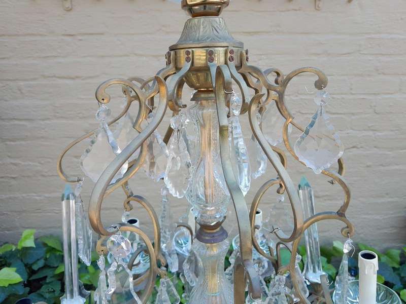 A 20th Century French Style Brass and Crystal Chandelier