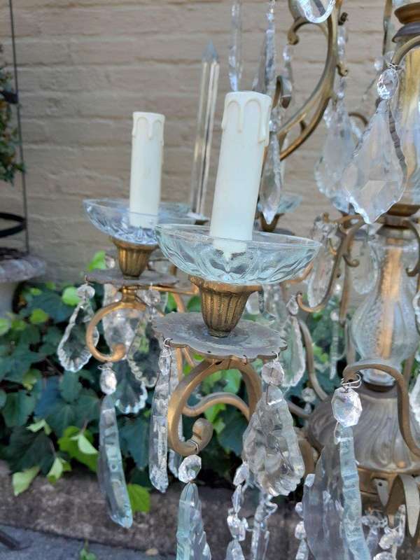 A 20th Century French Style Brass and Crystal Chandelier