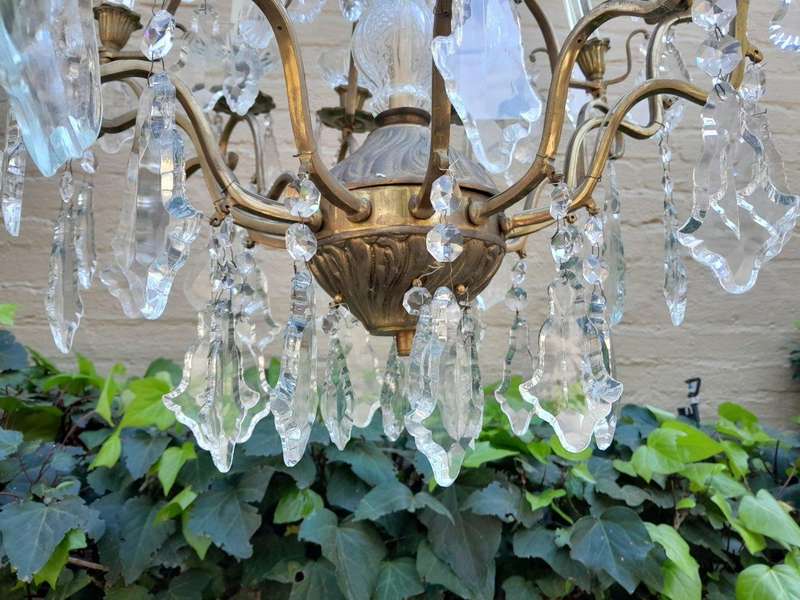 A 20th Century French Style Brass and Crystal Chandelier