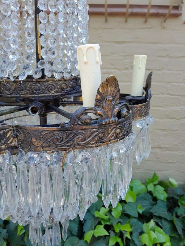 A 20th Century French Style Brass and Crystal Chandelier