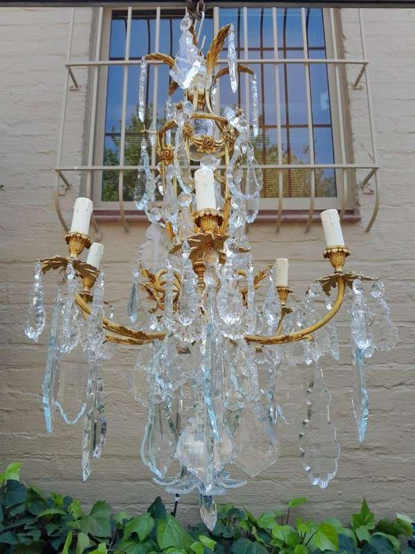 A 20th Century French Style Brass and Crystal Chandelier