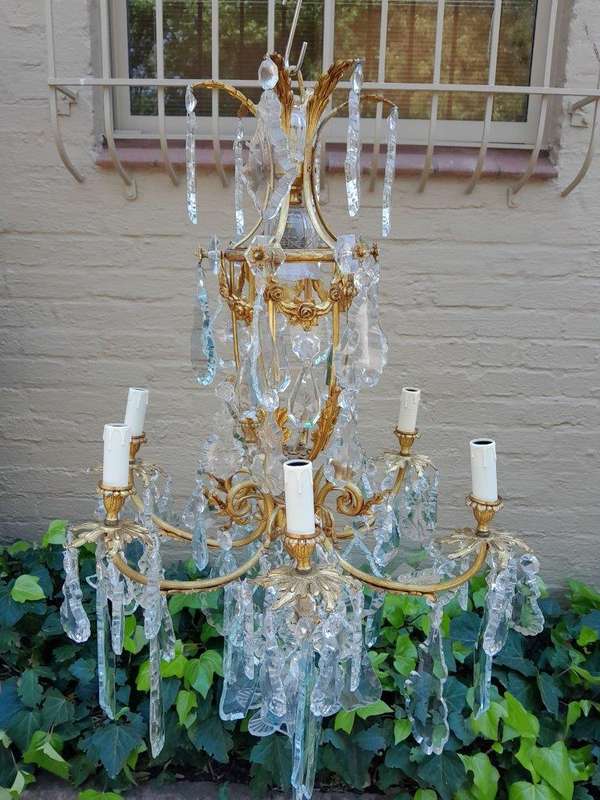 A 20th Century French Style Brass and Crystal Chandelier