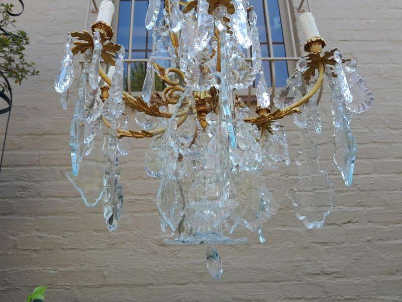 A 20th Century French Style Brass and Crystal Chandelier