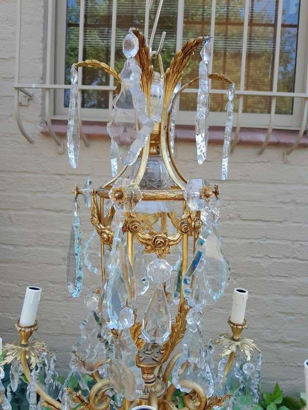 A 20th Century French Style Brass and Crystal Chandelier