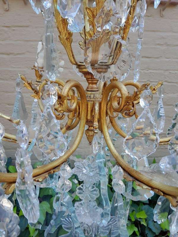 A 20th Century French Style Brass and Crystal Chandelier