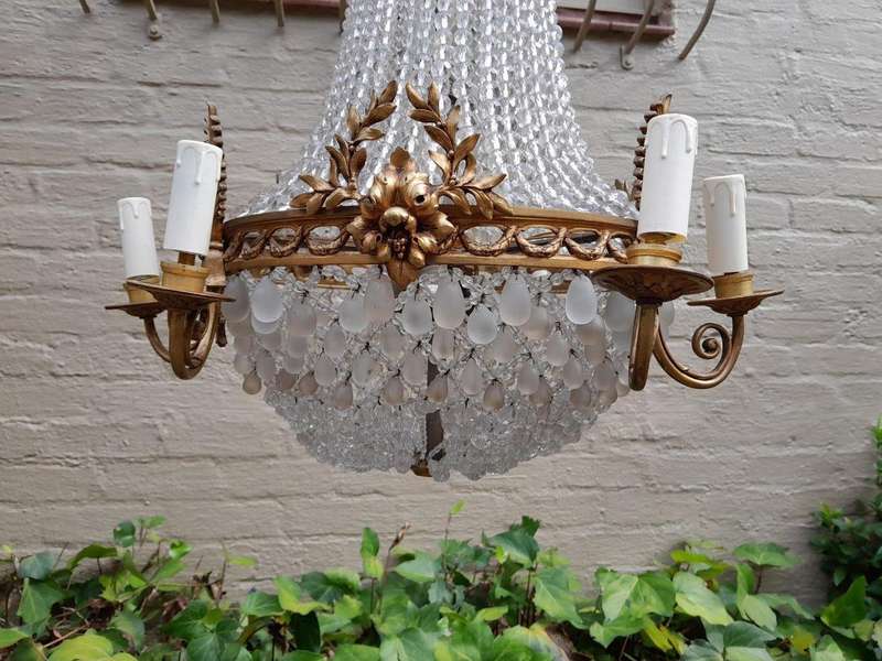 A 20th Century French Style Brass & Aged Chandelier