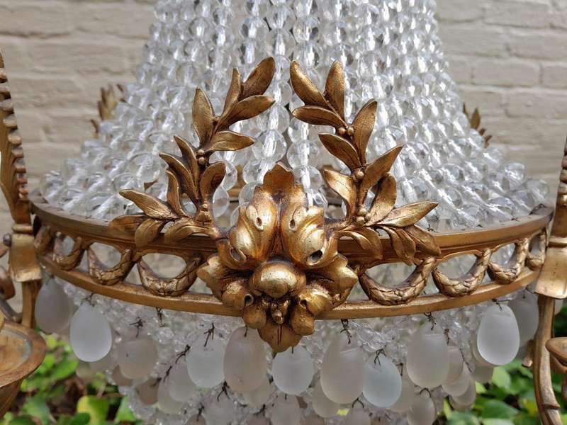 A 20th Century French Style Brass & Aged Chandelier