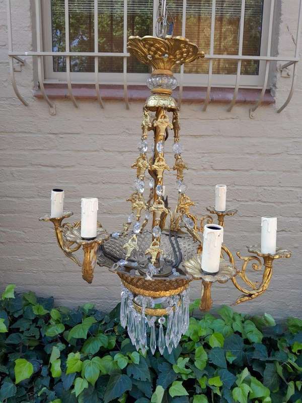 A 20th Century French Style Brass & Aged Crystal Chandelier