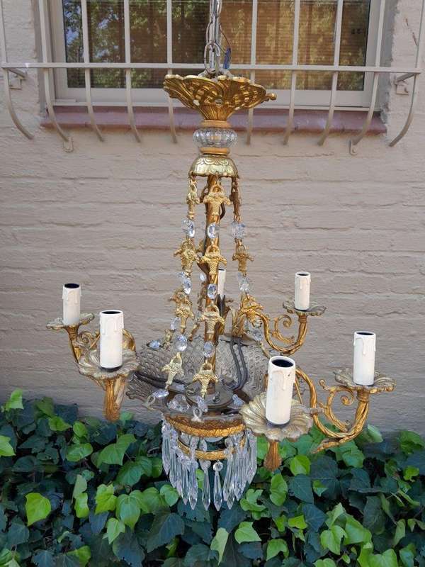 A 20th Century French Style Brass & Aged Crystal Chandelier