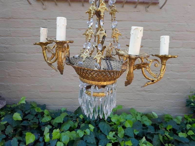 A 20th Century French Style Brass & Aged Crystal Chandelier