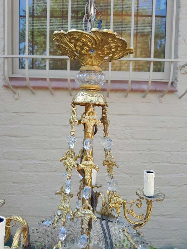 A 20th Century French Style Brass & Aged Crystal Chandelier