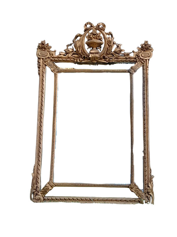 A French Rococo Style Ornately Carved and Gilded Bevelled Mirror