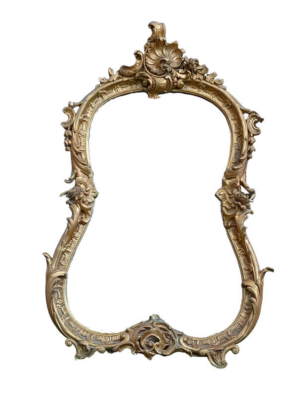 A French Rococo Style Ornately Carved and Gilded Bevelled Mirror
