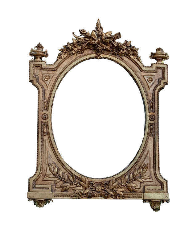 A French Rococo Style Ornately Carved and Gilded Bevelled Mirror