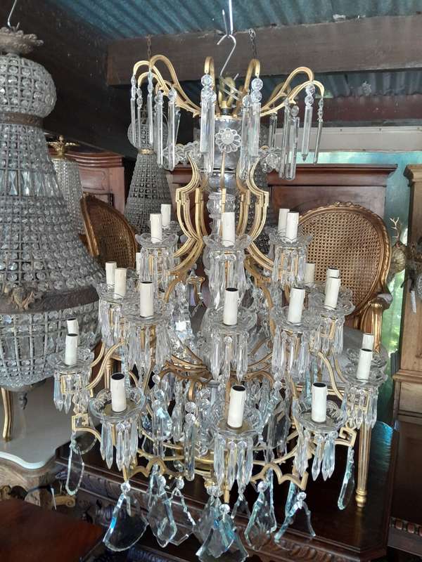 A 20th Century Large French Style Brass And Crystal Chandelier