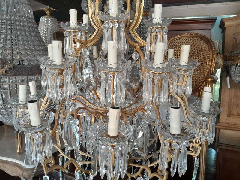 A 20th Century Large French Style Brass And Crystal Chandelier