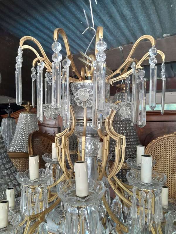 A 20th Century Large French Style Brass And Crystal Chandelier