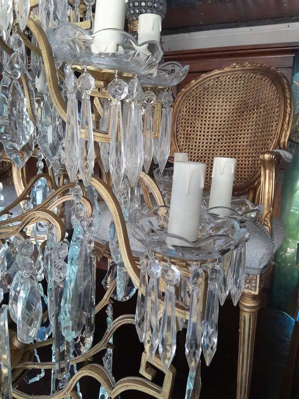A 20th Century Large French Style Brass And Crystal Chandelier
