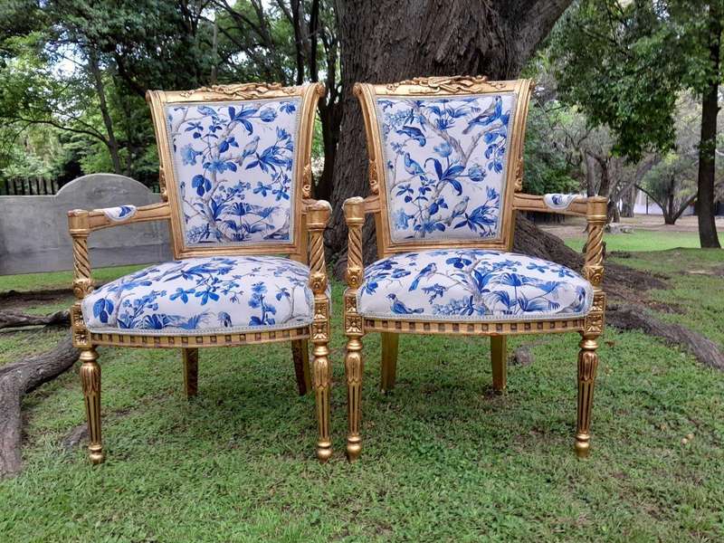A Pair Of 20th Century French Louis XVI Styled Ornately Carved And Gilded Fautelli Chairs (variou...