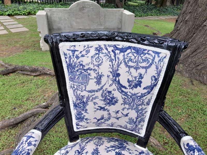 A Pair Of 20th Century French Louis XVI Styled Ornately Carved And Gilded Arm Chairs