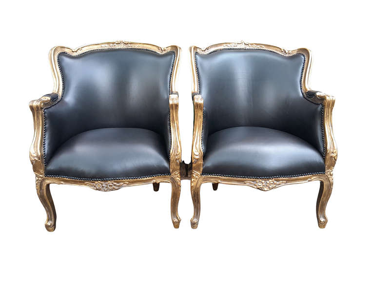 A 20th Century French Style Pair Of Carved Gilt Wood Armchairs