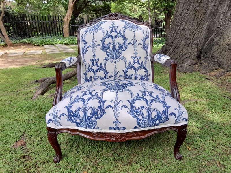 A 20th Century French Style Carved And Hand-Gilded Arm Chair With Foot-Rest