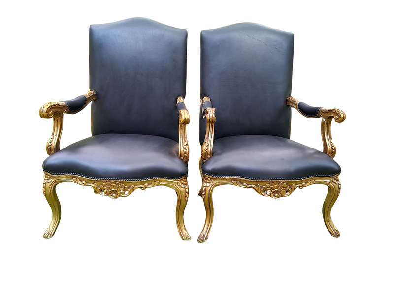A 20TH Century Pair Of French Style Carved and Giltwood High Back Armchairs Upholstered in Leather