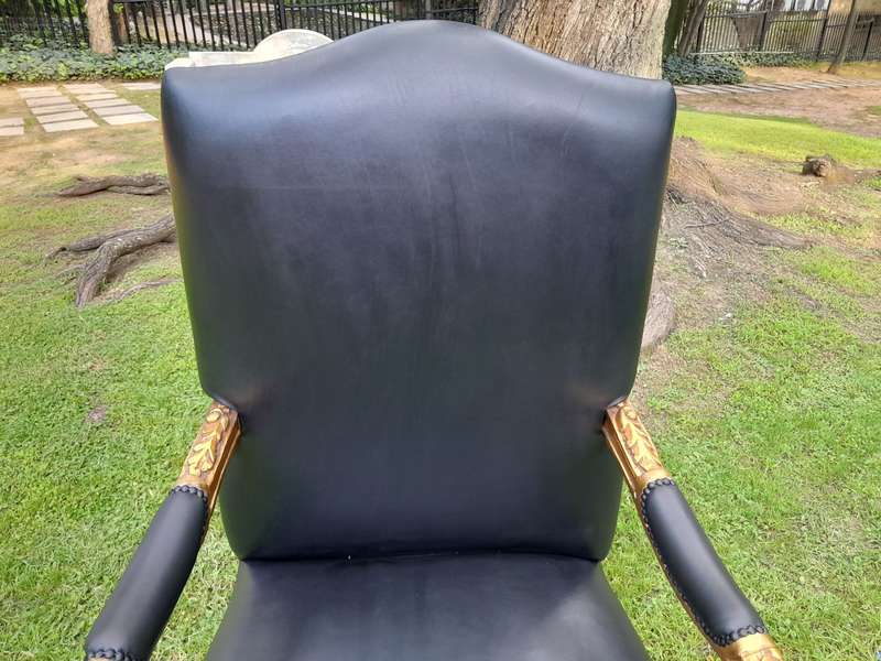 A 20TH Century Pair Of French Style Carved and Giltwood High Back Armchairs Upholstered in Leather