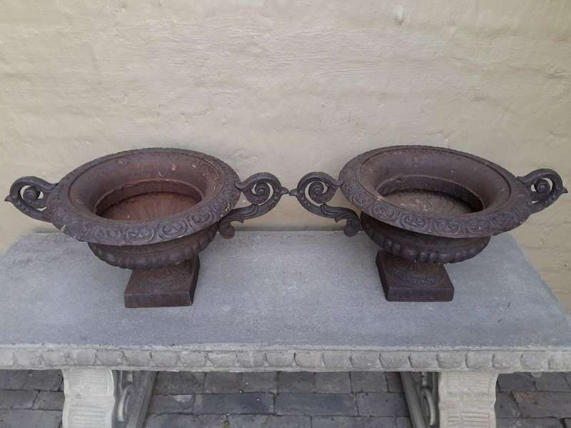 A 20th Century Pair Of Decorative Cast Iron Urns