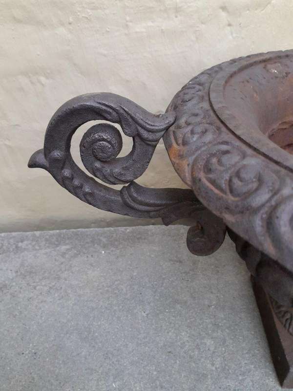 A 20th Century Pair Of Decorative Cast Iron Urns