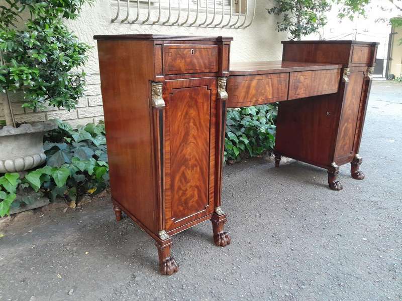 A George III Circa 1820 Mahogany / Flame Mahogany With Parcel Gild Sideboard With Two Cellarette ...