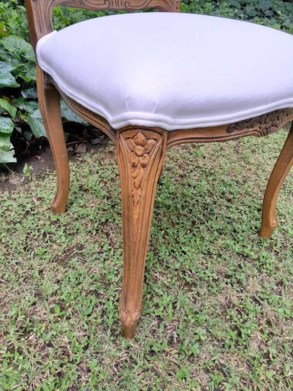 A Rare 20th Century Set Of Twelve French Colonial Style Walnut Rattan Dining Chairs