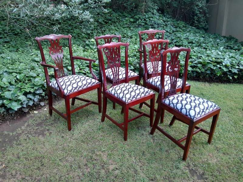 A 20th Century Set Of Six Mahogany Chippendale Style Chairs Including A Pair Of Armchairs/Carvers