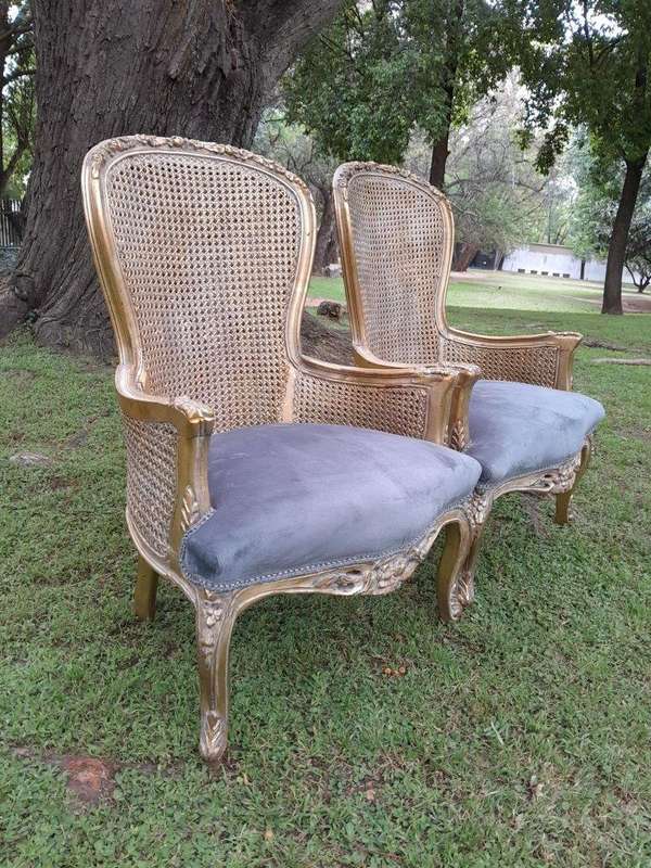 A 20th Century Pair Of French Style Rattan High Back Armchairs Hand Gilded