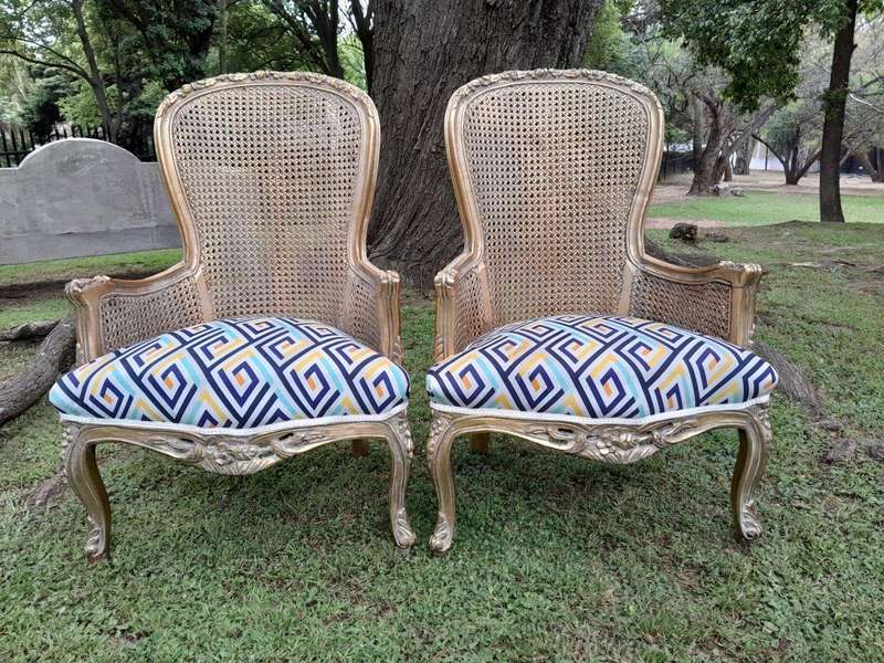 A 20th Century Pair Of French Style Rattan High Back Armchairs Hand Gilded