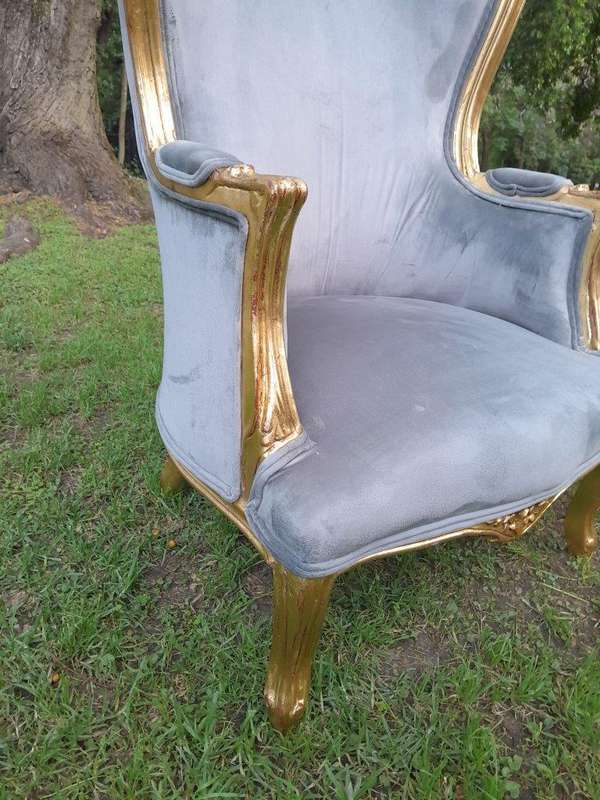 A Pair Of French Style Carved Wooden Wingback Armchairs
