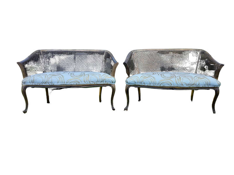 A Pair of French Style Carved and Gilded Wooden and Rattan Settees Upholstered in a Custom-Made L...