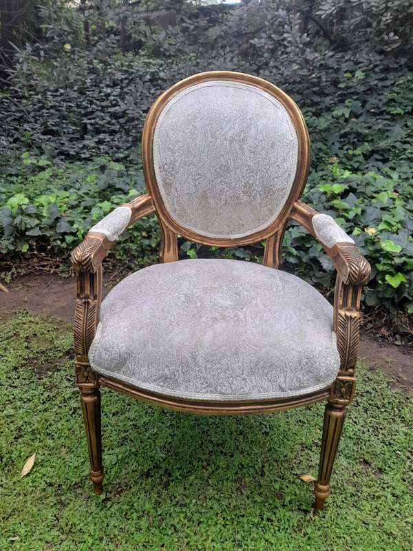A French Style Pair Of Wooden Armchairs
