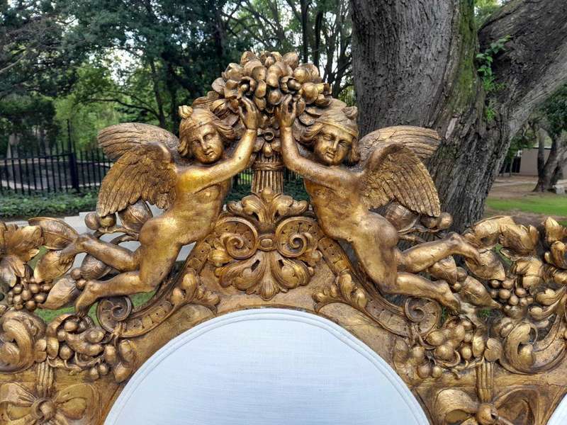 A 19th Century Ornately Carved Walnut Wood Settee Hand Gilded With Gold Leaf And Upholstered In A...