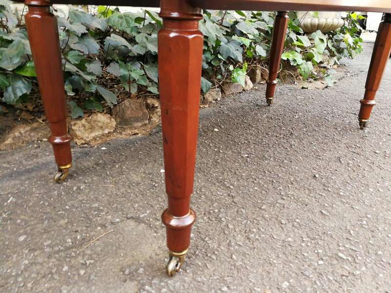 An Early 20th Century Mahogany Pembroke Table On Turned Legs